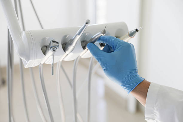 Professional Tooth Extraction technician working in Tower Lakes, IL
